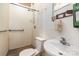 Small bathroom with toilet, sink, and shower stall at 207 Faulkner St, Clover, SC 29710