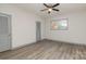 Bright bedroom with gray walls and wood-look flooring at 207 Faulkner St, Clover, SC 29710