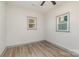 Well-lit bedroom featuring wood-look floors and ceiling fan at 207 Faulkner St, Clover, SC 29710