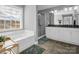 Main bathroom with soaking tub, double vanity, and shower at 228 Pinnacle Xing, Shelby, NC 28152