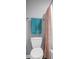 Clean bathroom with toilet, shower, and a teal towel at 228 Pinnacle Xing, Shelby, NC 28152