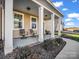 Inviting front porch with two chairs and brick flooring at 228 Pinnacle Xing, Shelby, NC 28152