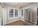 Bright breakfast nook with hardwood floors and window at 2604 Cochrane Dr, Charlotte, NC 28269