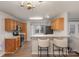 Modern kitchen with stainless steel appliances and oak cabinets at 2604 Cochrane Dr, Charlotte, NC 28269