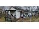 White sided house with porch and small yard at 308 S High St, Lincolnton, NC 28092