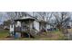 White sided house with porch and small yard at 308 S High St, Lincolnton, NC 28092