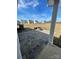 View of a backyard patio featuring an outdoor fireplace and stone benches at 3240 Mcharney Dr # 36, Harrisburg, NC 28075