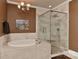 Bathroom with a large soaking tub and a separate shower at 373 Battery Cir, Clover, SC 29710