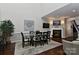 Bright dining area with hardwood floors and a view to the kitchen at 373 Battery Cir, Clover, SC 29710