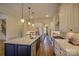 Spacious kitchen with granite countertops, stainless steel appliances, and custom cabinetry at 4010 Soleado Dr, Matthews, NC 28104