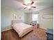 bedroom with ceiling fan and playful decor at 44743 Fish Camp Rd, New London, NC 28127