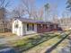 Ranch style home with metal roof and detached garage at 44743 Fish Camp Rd, New London, NC 28127