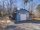 Detached metal workshop with covered area at 44743 Fish Camp Rd, New London, NC 28127