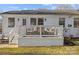 Private deck with seating area and brick steps at 4526 Wedgewood Dr, Charlotte, NC 28210