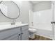 Clean bathroom with shower/tub combo and large mirror at 4827 Eaves Ln, Charlotte, NC 28215