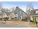 Two-story gray house with driveway and landscaping at 4827 Eaves Ln, Charlotte, NC 28215