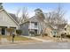 Two-story gray house on a street with other houses at 4827 Eaves Ln, Charlotte, NC 28215