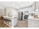 Modern kitchen featuring a large island and stainless steel appliances at 4827 Eaves Ln, Charlotte, NC 28215