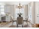 Bright kitchen with stainless steel appliances and white cabinets at 4827 Eaves Ln, Charlotte, NC 28215