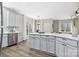 Modern kitchen with island and stainless steel appliances at 4827 Eaves Ln, Charlotte, NC 28215