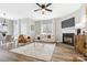 Living room with fireplace, hardwood floors, and neutral decor at 4827 Eaves Ln, Charlotte, NC 28215