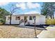 Charming single-story home with white exterior and a cozy front porch at 5113 Grice Ct, Charlotte, NC 28210