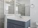 Modern bathroom with gray tile shower and vanity at 539 W Tremont Ave, Charlotte, NC 28203