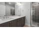 Double vanity bathroom with a large walk-in shower at 539 W Tremont Ave, Charlotte, NC 28203