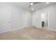 Spacious bedroom with ample closet space and neutral carpeting at 539 W Tremont Ave, Charlotte, NC 28203