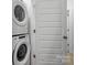 Stackable washer and dryer in laundry closet at 539 W Tremont Ave, Charlotte, NC 28203