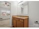 Bathroom with granite countertop and wood cabinets at 611 Cahill Ln, Fort Mill, SC 29715