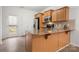 Kitchen with granite countertop and light wood cabinets at 611 Cahill Ln, Fort Mill, SC 29715