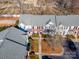 Aerial view of townhouses with parking and landscaping at 8044 Sapwood Ct, Matthews, NC 28104