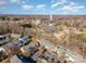 Aerial view of community with townhouses, park and surrounding area at 8044 Sapwood Ct, Matthews, NC 28104