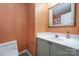 Clean bathroom with updated vanity and peach walls at 8044 Sapwood Ct, Matthews, NC 28104