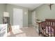 Bright bedroom with ample closet space and neutral walls at 8044 Sapwood Ct, Matthews, NC 28104