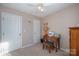 Well-lit bedroom with double closets and neutral decor at 8044 Sapwood Ct, Matthews, NC 28104