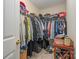 Large walk-in closet with ample hanging space and shelving at 8044 Sapwood Ct, Matthews, NC 28104