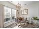 Simple dining area with a round wooden table and chairs at 8044 Sapwood Ct, Matthews, NC 28104