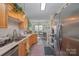 Modern kitchen with stainless steel appliances and wood cabinets at 8044 Sapwood Ct, Matthews, NC 28104