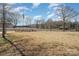 Relaxing park area with a gazebo and benches under the shade of trees at 8044 Sapwood Ct, Matthews, NC 28104