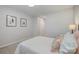 Well-lit bedroom featuring a double bed and closet at 8146 Rudolph Rd, Charlotte, NC 28216