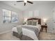 Bedroom with queen bed and ceiling fan at 8146 Rudolph Rd, Charlotte, NC 28216