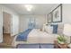 Spacious bedroom with king bed and access to hallway at 8146 Rudolph Rd, Charlotte, NC 28216