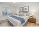 Bright bedroom with king-size bed and window at 8146 Rudolph Rd, Charlotte, NC 28216