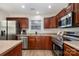 Updated kitchen featuring stainless steel appliances and ample counter space at 8146 Rudolph Rd, Charlotte, NC 28216