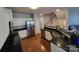 Open concept kitchen with granite countertops and stainless steel appliances at 9323 Lenox Pointe Dr, Charlotte, NC 28273