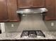 Modern kitchen with stainless steel range and hood at 10028 Nw Trailhead Nw Way, Huntersville, NC 28078