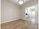 Dining area with hardwood floors and kitchen access at 104 Pratt St, Belmont, NC 28012