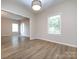 Dining room with hardwood floors and chandelier at 104 Pratt St, Belmont, NC 28012